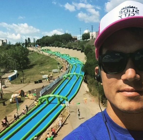 Chris Conran shares selfie with water slide.
