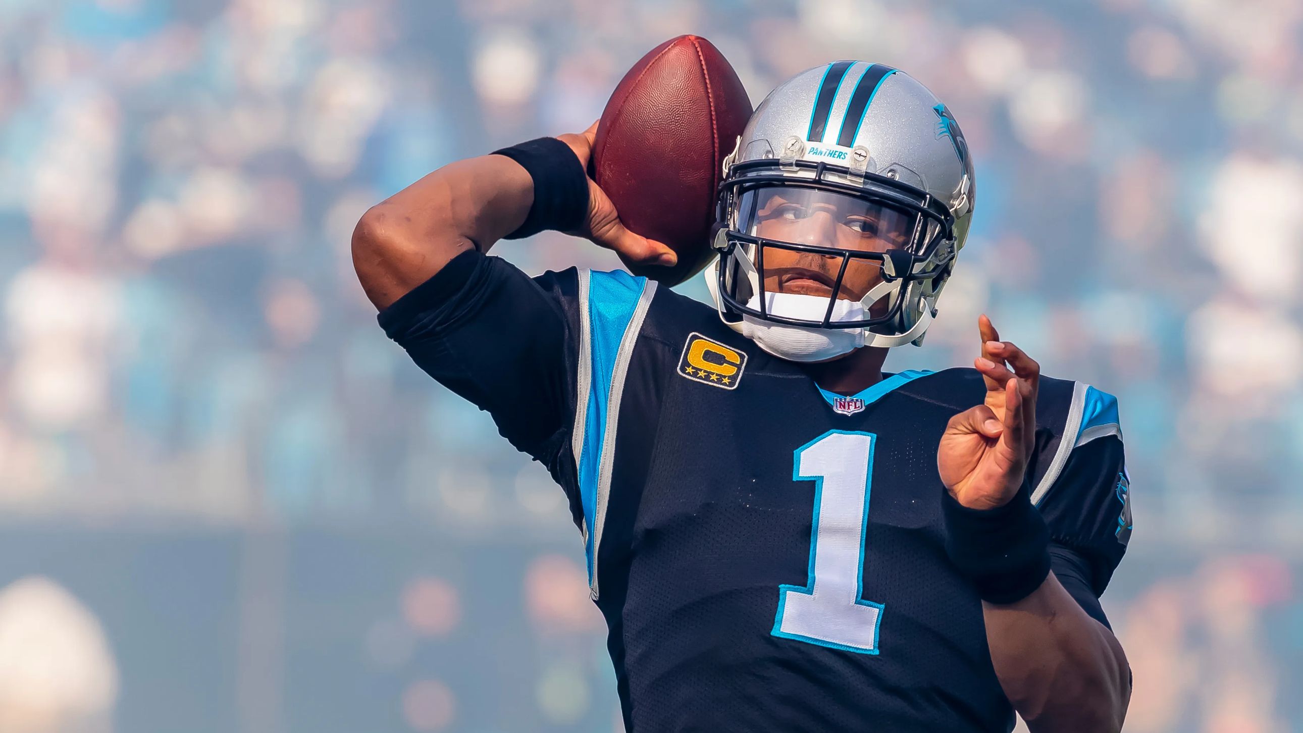 Cam Newton throwing the ball