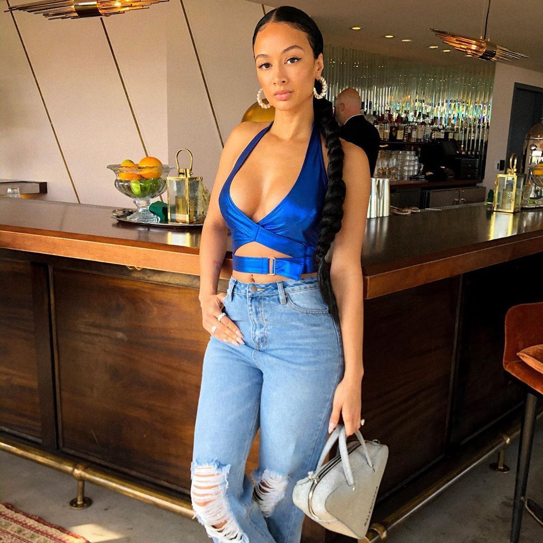 Draya Michele in ripped jeans and top