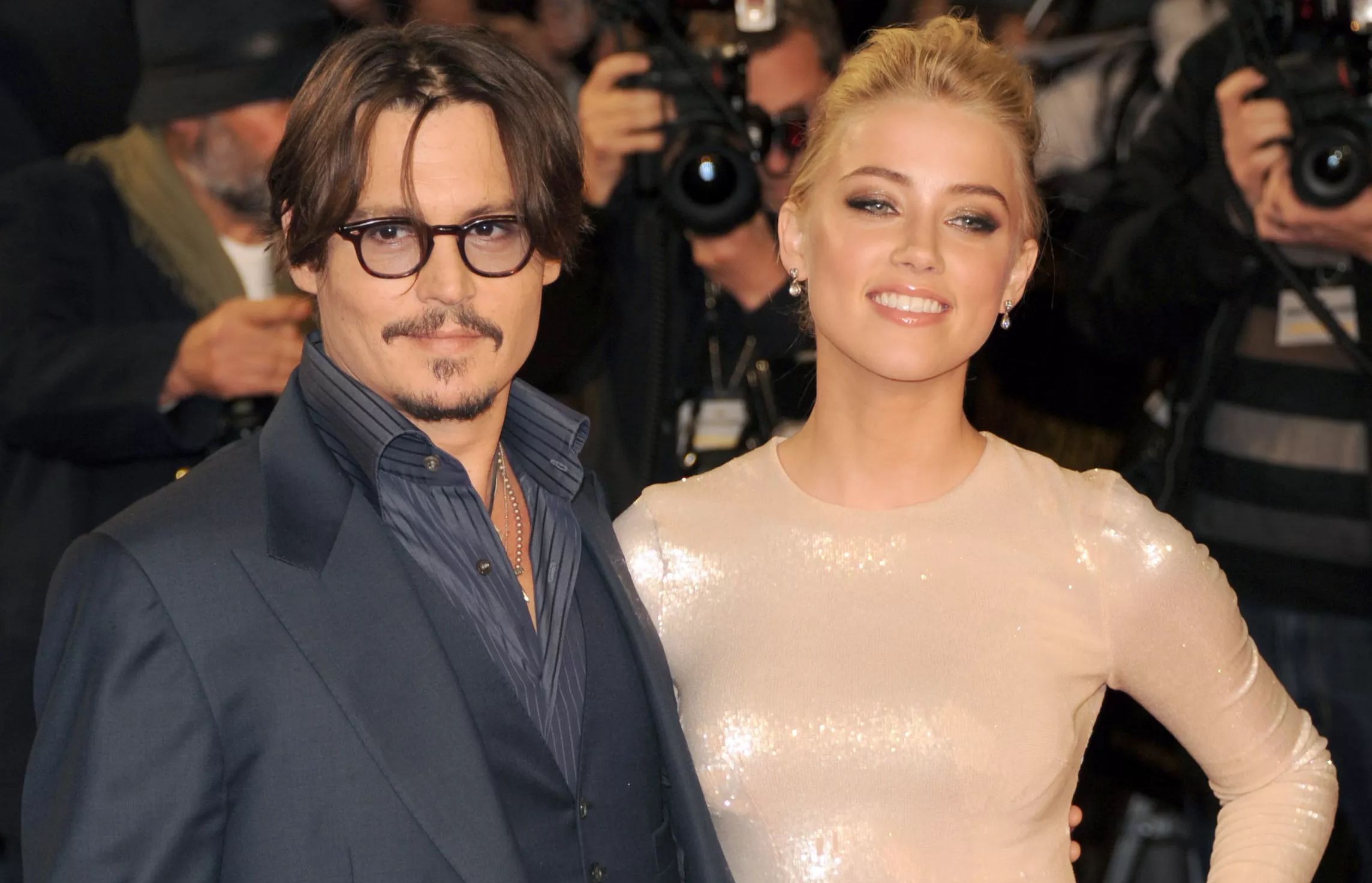 Did Amber Heard just confess to physically abusing Johnny Depp? Apparently she pelted the actor with pots and pans during their marriage. Read to find more details. 12
