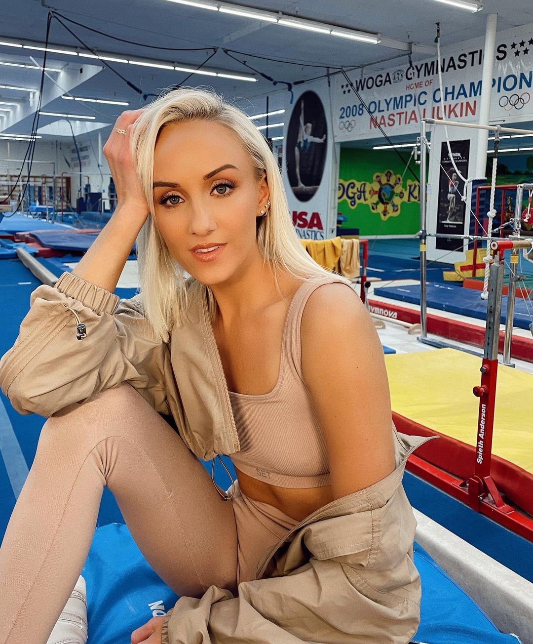 Nastia Liukin poses in a gym.