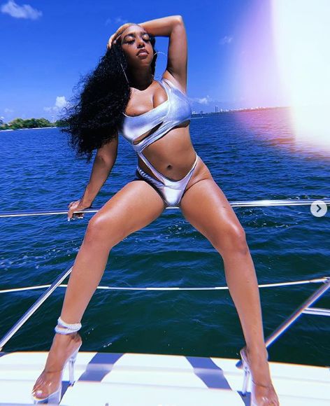 B Simone Spreads Legs On Miami Yacht In Monokini To Explain Money