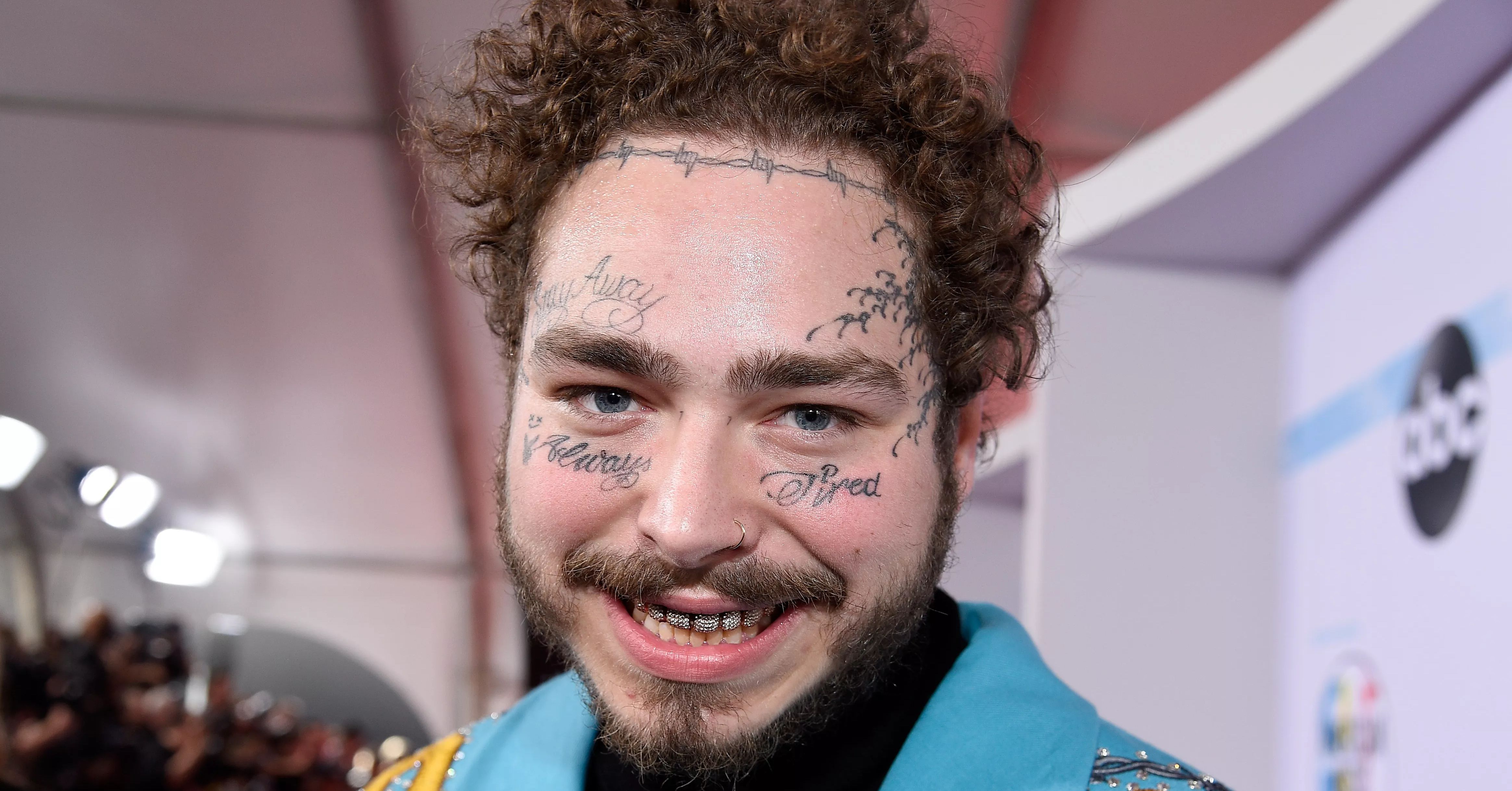 Post Malone Admits To Using Face Tattoos as a Distraction From Physical ...