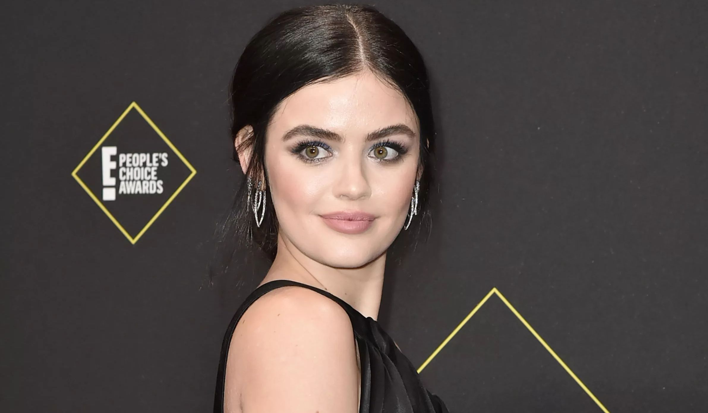 Lucy Hale poses at an event. 